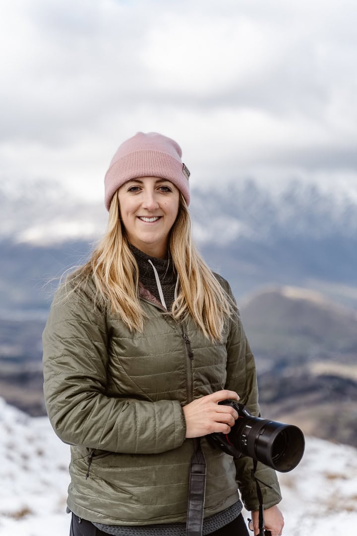 Kara Herbert portrait holding camera
